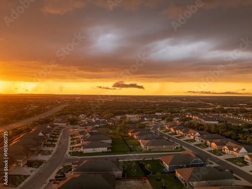 Aerial view of a dramatic sunset lighting clouds before severe thunderstorm near Georgetown Texas