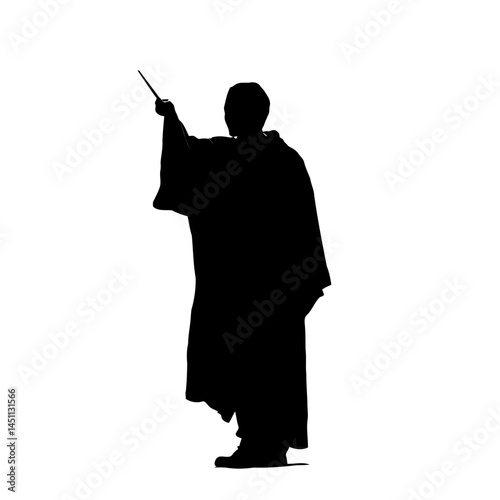 Solid black silhouette of a wizard casting, vector EPS