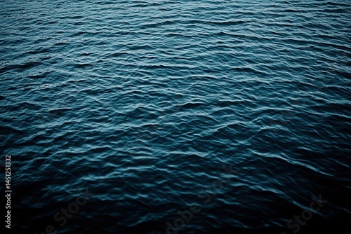 Rippled dark blue water surface
