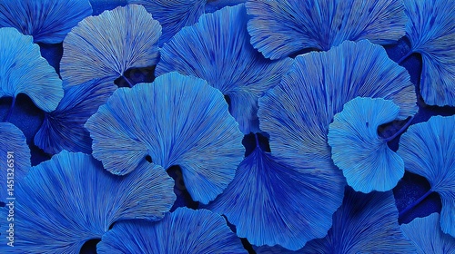 Close-up of vibrant blue leaves, showcasing intricate textures and patterns.