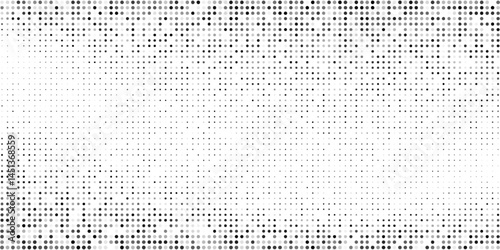 Grunge dotted halftone gradient texture. Vanishing polka dot background. Repeating dots design