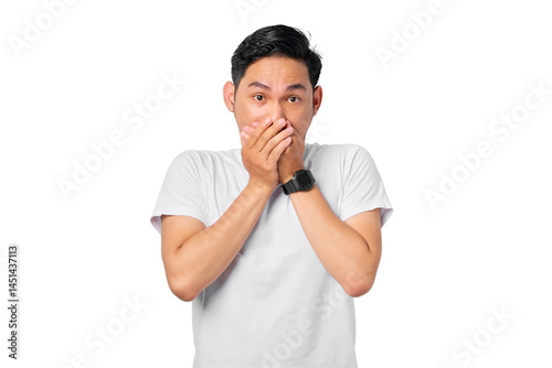 Portrait of scared young Asian man covering mouth with two hands isolated on transparent background