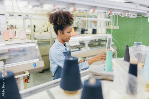 An American female designer and factory owner revolutionizes the textile industry by combining traditional weaving skills with advanced machinery and environmentally sustainable practices.