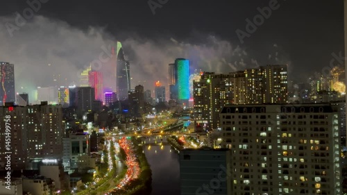 Ho Chi Minh City, Vietnam April 30, 2025 4k video of epic fire work performance to reunification Day of Vietnam at Sai Gon River look from the Gold view apartment, district 4 