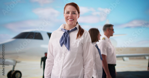 Beautiful Stewardess Poses In Front Of Private Jet