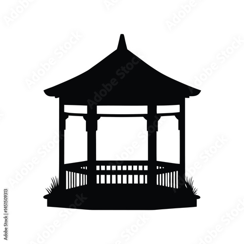 Black silhouette of a gazebo in a garden with grass and open space