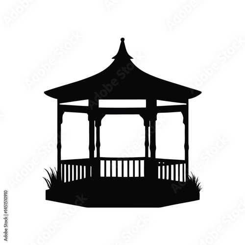 Black silhouette of a gazebo in a garden with grass and open space