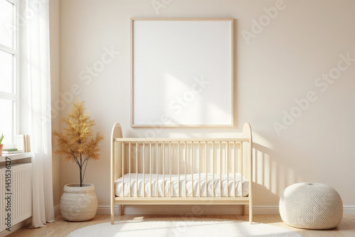 modern nursery room with a light wooden crib centered against a soft-toned wall, above it a large empty picture frame mockup