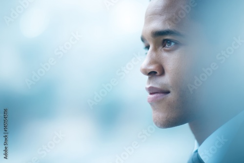 minimalist portrait of person representing diverse demographics with blurred background and ample copy space