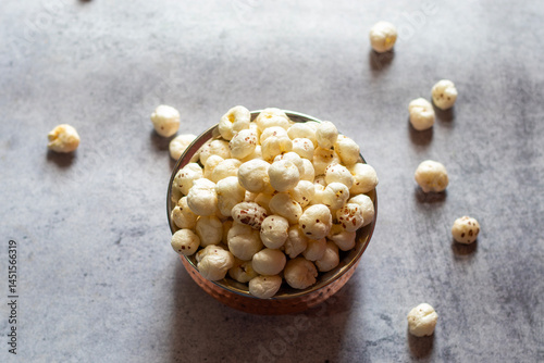 Makhana, also known as fox nuts, is a nutritious, low-calorie snack rich in protein, fiber, and antioxidants, often used in Indian cuisine and healthy snacks.
