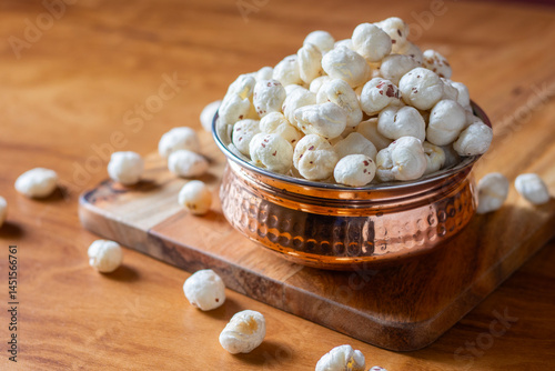 Makhana, also known as fox nuts, is a nutritious, low-calorie snack rich in protein, fiber, and antioxidants, often used in Indian cuisine and healthy snacks.
