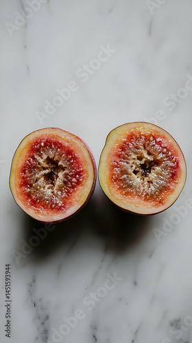 Obraz na płótnie Halved figs, marble background, food photography w salonie