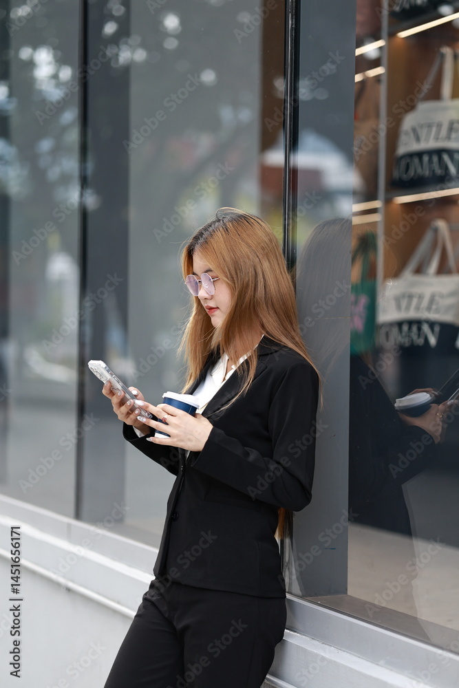 Fototapeta premium Cheerful women shopping together outdoors, carrying bags, symbolizing lifestyle, fashion, friendship, and enjoyment across generations in a modern city. 