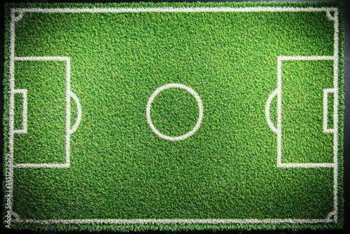 Green soccer field with white lines.  Detailed view of the playing area with marked penalty areas, center circle, and goal areas