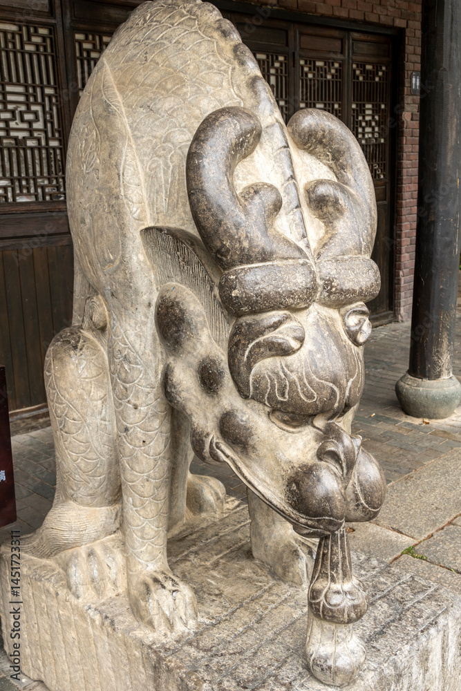 Statue of a Chinese guardian lion seen at Gankeng Hakka Town in Shenzhen, China