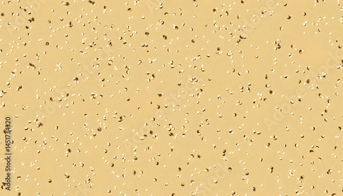 Textured yellow surface with speckles for design backgrounds  