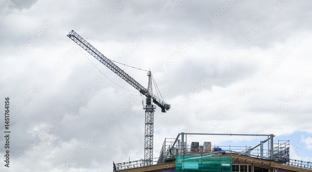 Construction crane above the building. Auckland.