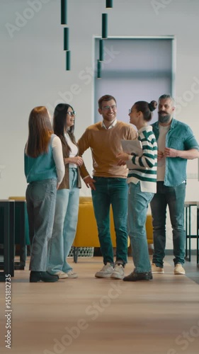 Wallpaper Mural A diverse, multiethnic business team of entrepreneurs and leaders in a modern office, collaborating in an open space. Their teamwork, motivation, and partnership fuel the company's growth and success Torontodigital.ca