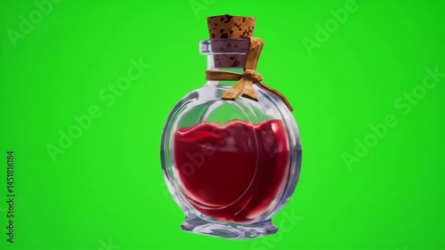 Magic red potion in glass bottle