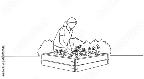 Woman Gardening in Raised Bed with Flowers  
