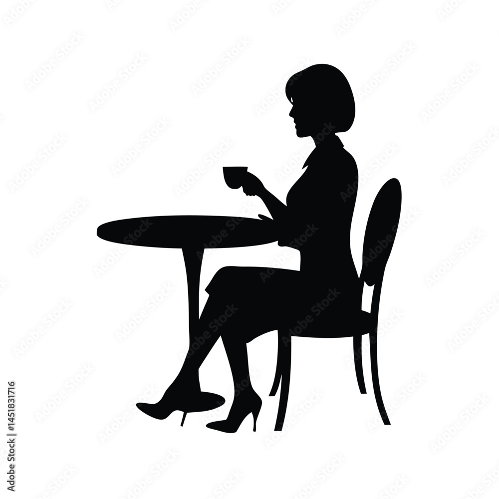 Fototapeta premium Silhouette of a woman sitting at a table enjoying a cup of coffee