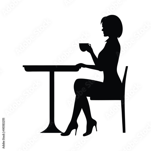 Silhouette of a woman sitting at a table enjoying a cup of coffee