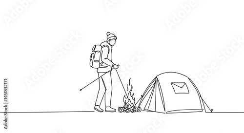 Camping enthusiast starting a fire next to a tent in nature  
