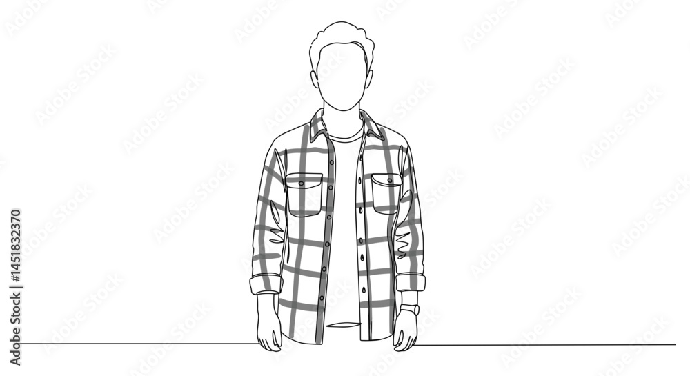 Young man standing confidently in a plaid shirt against a plain background