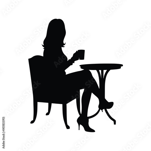 Silhouette of a woman sitting at a table enjoying a cup of coffee