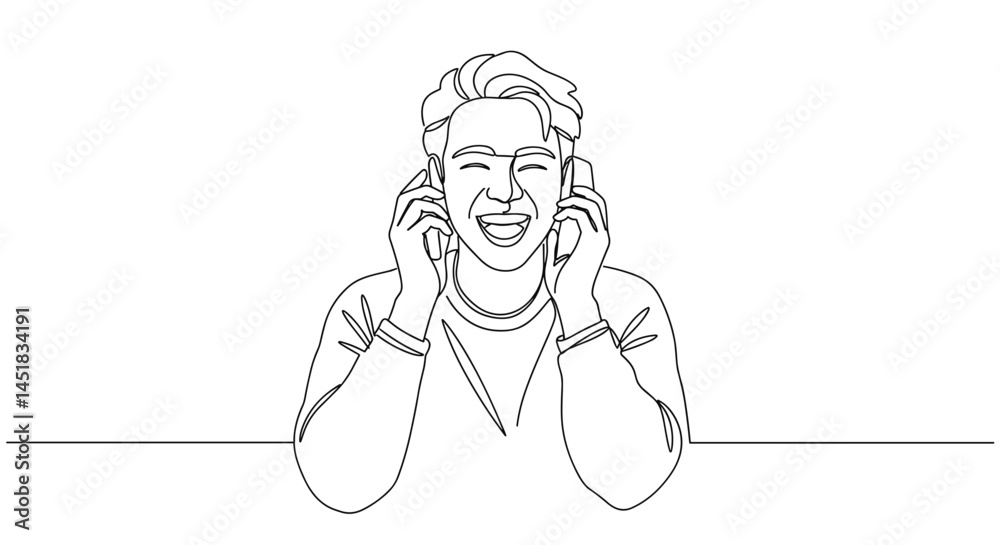 Happy young man enjoying music while wearing headphones