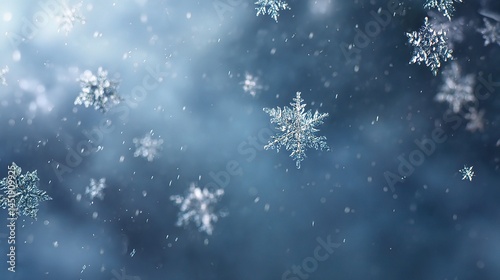 Obraz na płótnie Close-Up of Falling Snowflakes on a Soft Blue Background w salonie