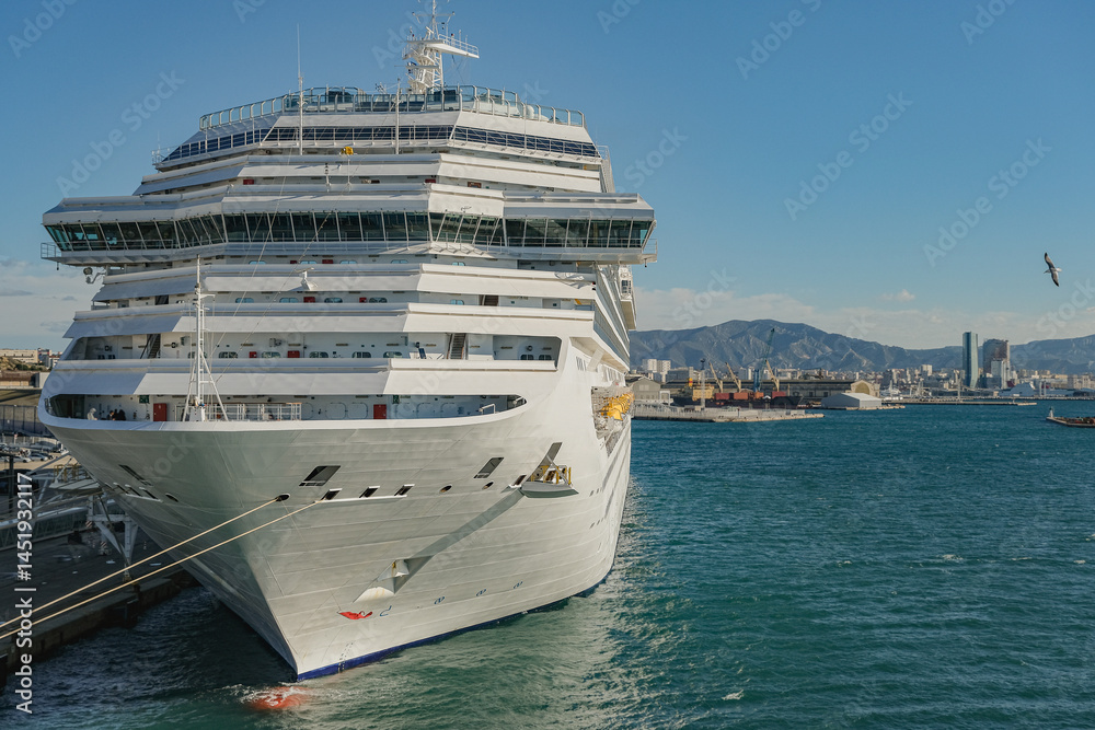 Mega family cruiseship cruise ship liner Fortuna docked at terminal in Marseille Provence, France during breathtaking sunset sunrise twilight blue hour dusk dawn silhouette scenic panorama
