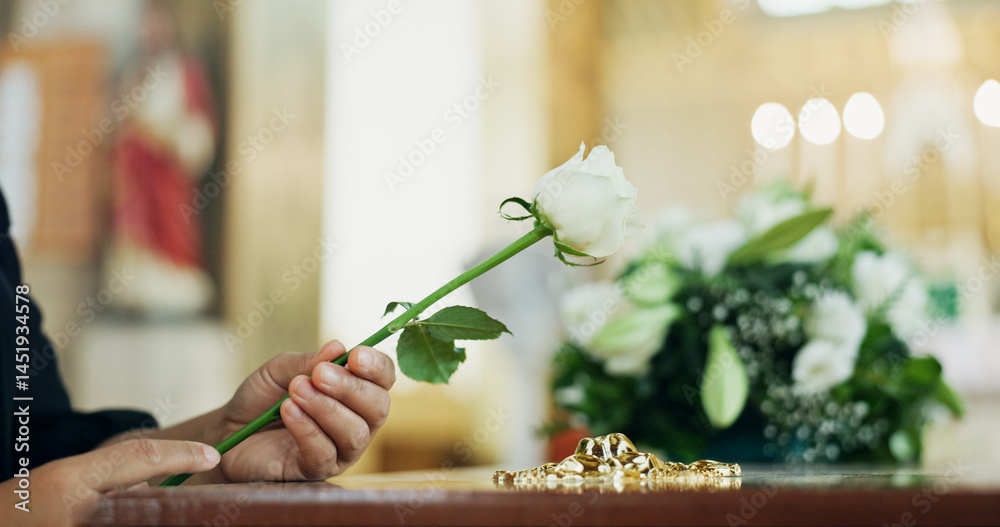 Funeral, hand or person with flower or loss in church for farewell service, mourning death or grief. Coffin, goodbye or grieving with sorrow or rose in cathedral for burial, ceremony and memorial