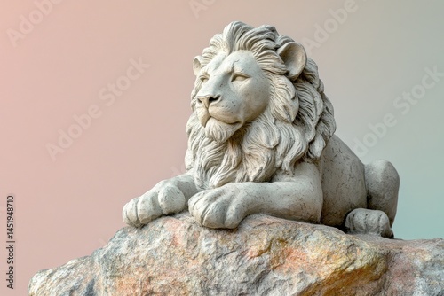 A stone lion statue resting serenely on a rock formation.