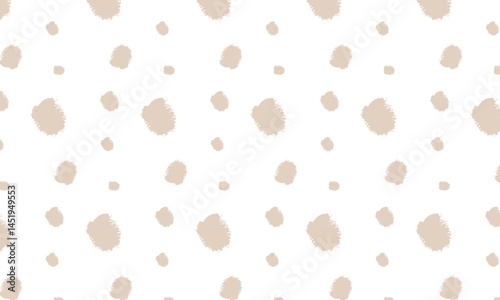 Hand drawn dotted seamless pattern in grungy style. rough organic hand drawn polka seamless pattern.  perfect for fabric, packaging, wallpapers, and trendy minimalist backgrounds.