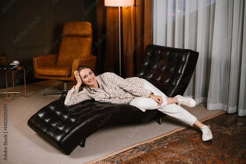 Relaxed Woman Smiling In Therapist's Chair