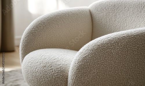 Cozy Textured Chair: Soft Cream Armchair Detail, Comfortable Design