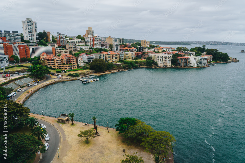 Obraz premium Wideshot of kirribilli with the olympic park and Milsons Point in Sydney Harbour, NSW, Australia
