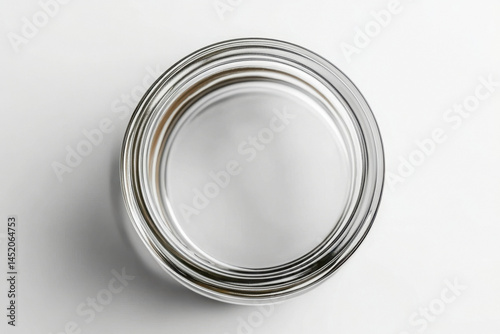 Empty glass jar top view close up on white background