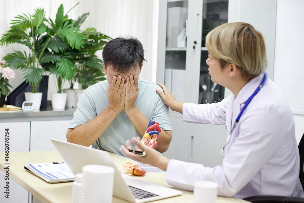 Fototapeta premium Doctor comforts distressed patient in medical office, showing empathy and support