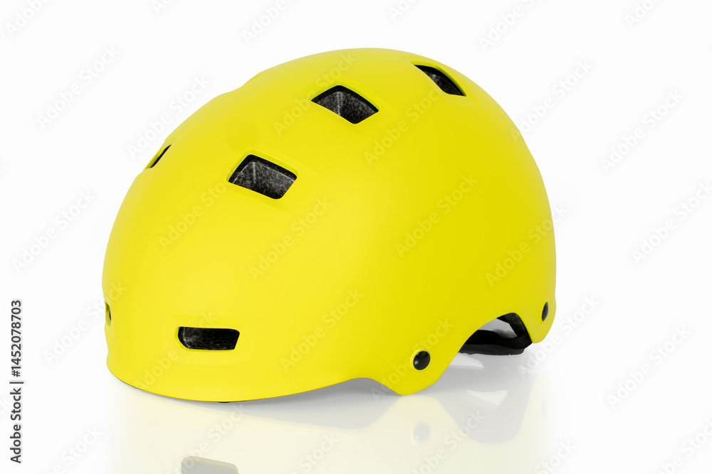 Fototapeta premium Yellow helmet on a white table and isolated