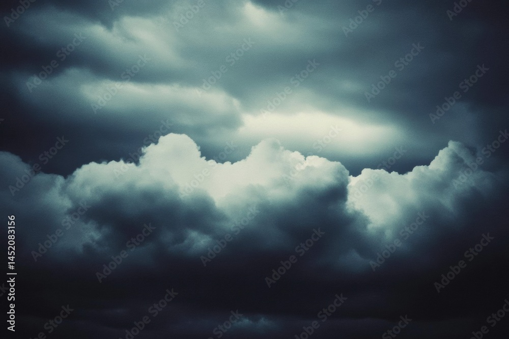 Obraz premium Ominous Warning: Captivating Dark Moody Storm Clouds in Dramatic Sky Look Awe-Inspiring and Threatening