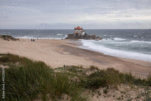 church Capela do Senhor da Pedra on the beach in Porto, Portugal