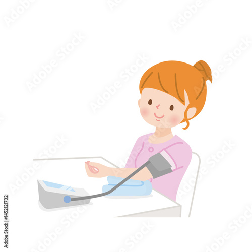 血圧を測る若い女性