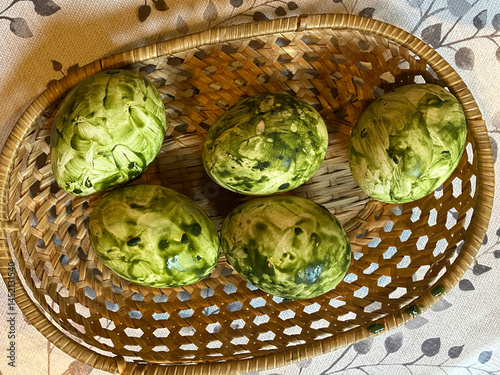 Easter eggs painted using natural colours: onion and green tea.
