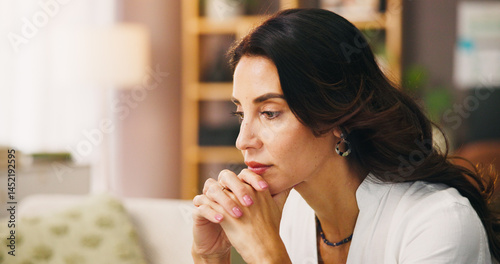 Thinking, stress and woman in home on sofa with anxiety for issue, problem and reflection in living room. Apartment, morning and thoughtful person with worry, overthinking and wondering in house