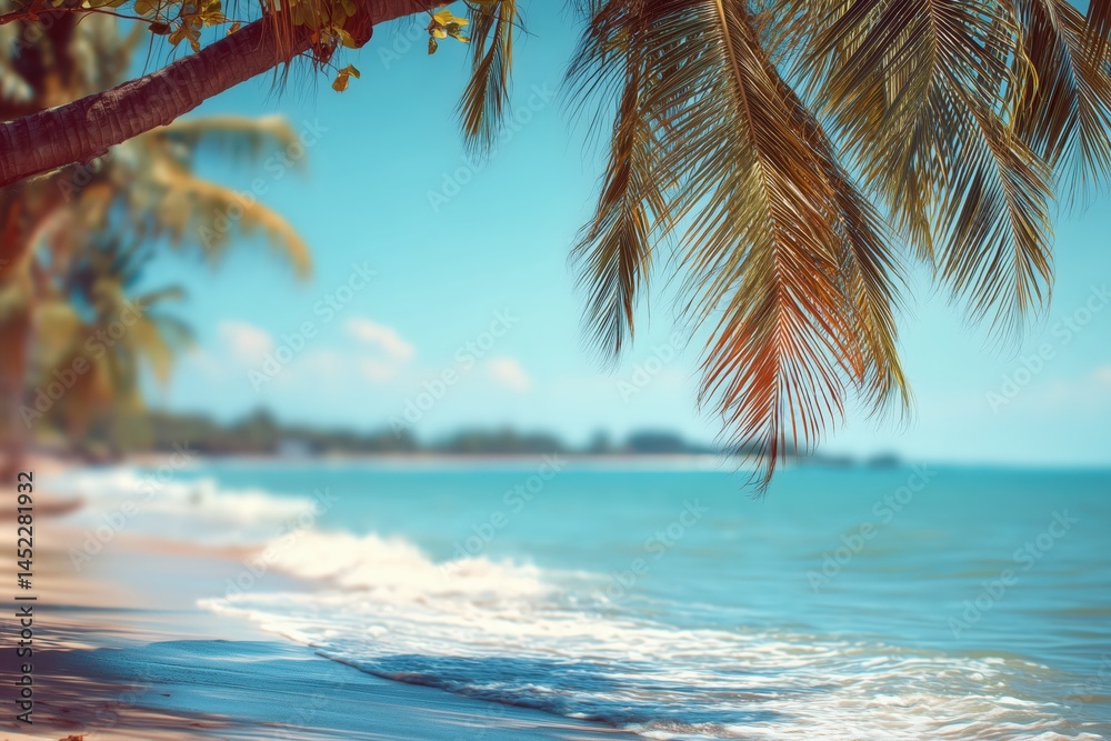 Fototapeta premium Tropical Beach Scene with Palm Tree Branches and Ocean View