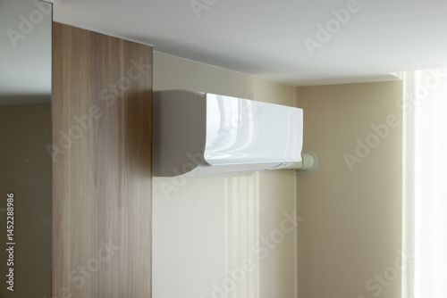 Air conditioner wall mount indoor unit. Part of air conditioning HVAC split system for climate, temperature and humidity control. To cool or cold in room of home building. 
