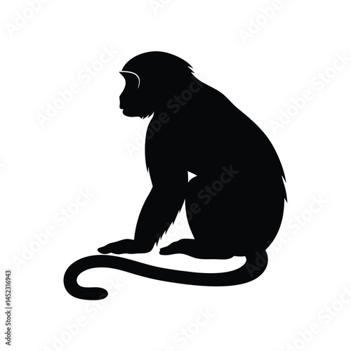 Silhouette vector of a monkey sitting, depicting a chimpanzee primate in black and white