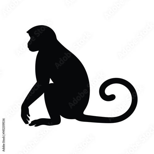 Silhouette vector of a monkey sitting, depicting a chimpanzee primate in black and white